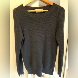 This Wilfred Free Black waffle knit sweater is very soft and comfy.